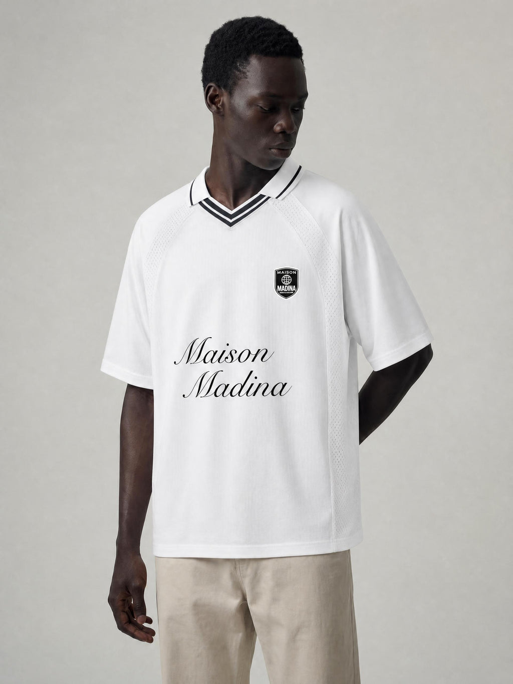 Maillot de football rayé noir — vue principale — Maison Madina